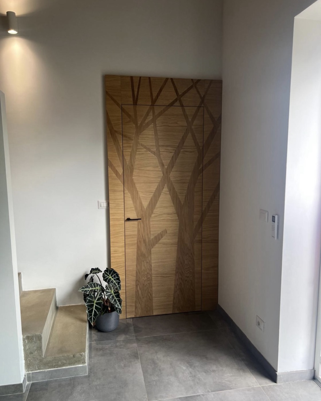 Porta interna in rovere realizzata da Serramenti & Serramenti